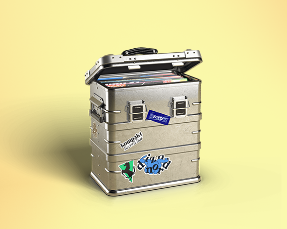 Travel Heavy aluminium record case with the lid open, showing records inside and record shop stickers